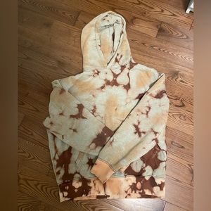 It’s a size large, it was currently a black and then I tie died it bleach.